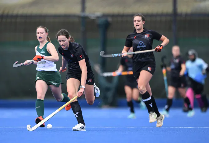Cardiff and Swansea women chase the ball during their Varsity hockey match.